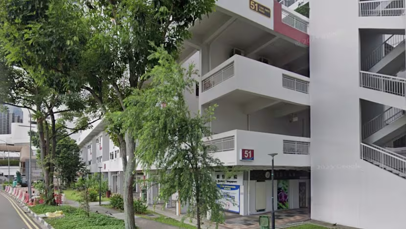 HDB block along Chin Swee Road in soft morning light
